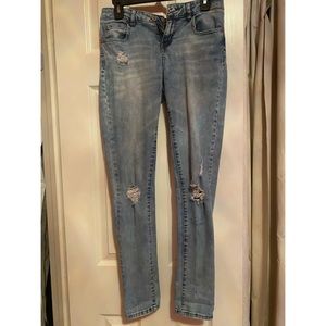 Skinny light wash ripped jeans